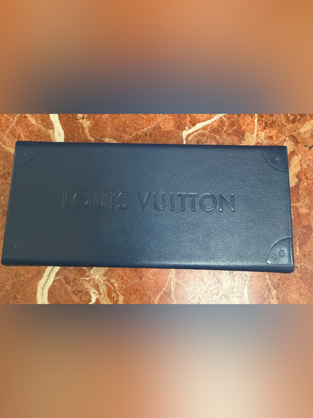 Louis Vuitton Deep Blue Embossed Leather case